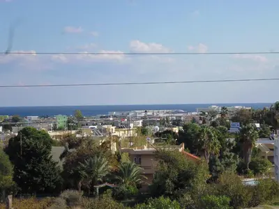 a view of a city with trees and buildings at Farkia Exclusive Studios in Faliraki