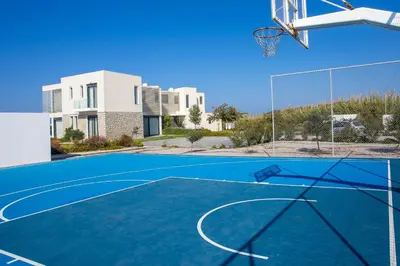 an image of a basketball court with a hoop at Liam Beach Front Luxury Villa with 100m2 infinity pool in Phanaes