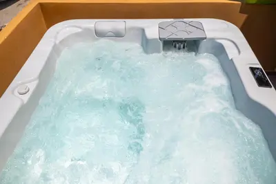 a bath tub filled with water in a box at Asimenis Cottages in Kattavía