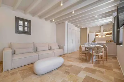 a living room with a couch and a table at Casa Alizeta in Halki