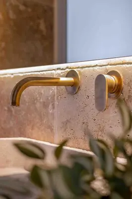 a door with a brass handle and a window at Casa Alizeta in Halki