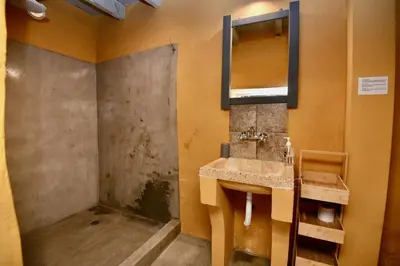 a bathroom with a sink and a mirror at PENELOPE garden house old town in Rhodes Town