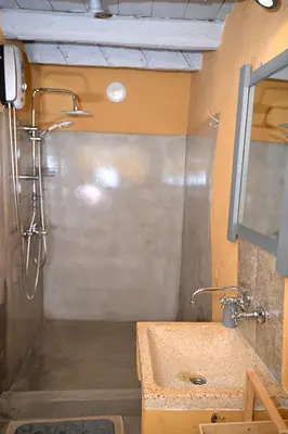 a bathroom with a sink and a shower at PENELOPE garden house old town in Rhodes Town