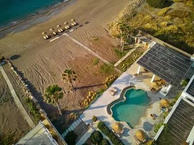 an aerial view of a beach with a solar array at Exquisite Rhodes Villa Villa Boho Chic 6 Bedrooms Private Pool in Lachania