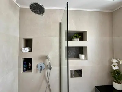 a shower with a glass door in a bathroom at Villa Marina - Glystra Beach in Kiotari