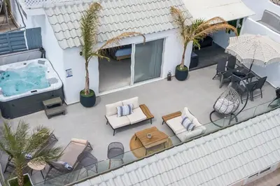an overhead view of a patio with a hot tub at JnS Premium Stay in Faliraki
