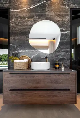 a bathroom with a sink and a mirror at Emerald & Ruby Villas in Asgourou