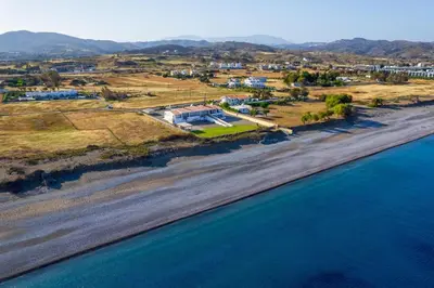 an aerial view of a beach and the ocean at Psychedelia Beach House in Gennadi