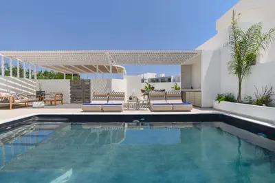 an image of a swimming pool in a house at Mylos Luxury Escape Villa in Faliraki