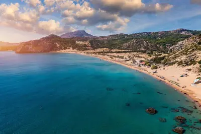 an aerial view of a beach with people on it at ARYVE Townhouse Rhodos mit Akropolis- und Meerblick sowie Jacuzzi und tollen Sonnenterrassen und Garten in Malona Village