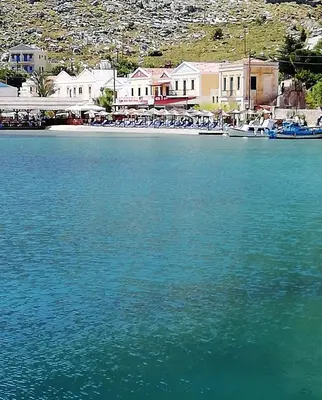 a large body of water with a group of boats at Perla di Mare - Katoi 1 in Symi