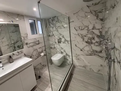 a bathroom with a shower and a toilet and a sink at Kyra Maria 2, view Apartment in Rhodes Town