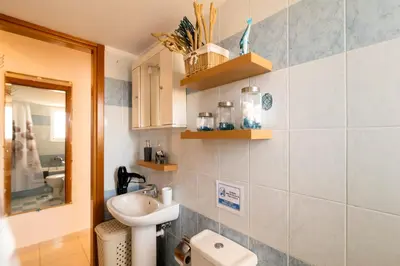 a bathroom with a sink and a toilet at Sunset View in Rhodes Town