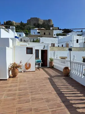 a balcony of a house with white buildings at Terrace Studio in Rhodes Town