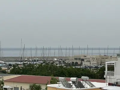 a view of a harbor with boats in the water at Rhodes Views in Rhodes Town
