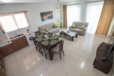 an aerial view of a living room with a table at Rhodes Views in Rhodes Town