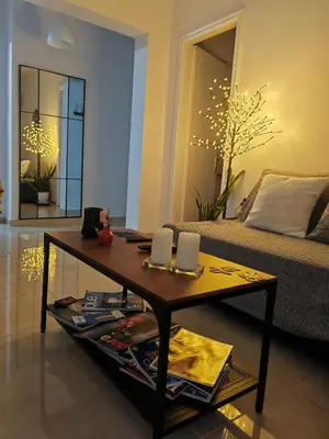 a living room with a coffee table and a couch at Leo's & Xerxes' place in the Heart of Rhodes in Rhodes Town