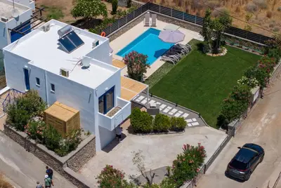 an aerial view of a house with a swimming pool at Villa Mariani II - in Lothiarika, newly renovated June 2024, private pool, Lindos 10 min, beach 120m in Lardos