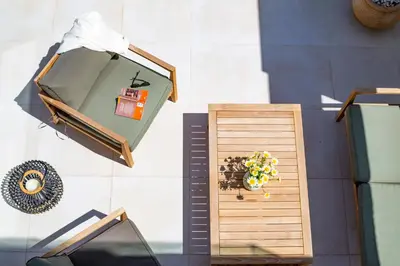 an overhead view of a wooden box with a plant at Villa Laura in Afantou