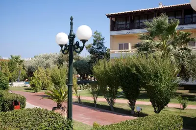 a street light in front of a building at Golden Odyssey in Kolimbia