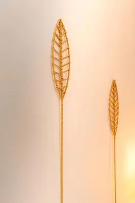 two ears of wheat on a wall at Lilliput Garden in Rhodes Town
