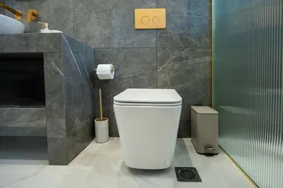 a bathroom with a white toilet and a sink at Rhodes Center Luxury Suite in Rhodes Town
