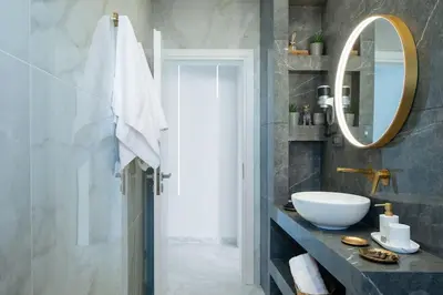 a bathroom with a sink and a mirror at Rhodes Center Luxury Suite in Rhodes Town