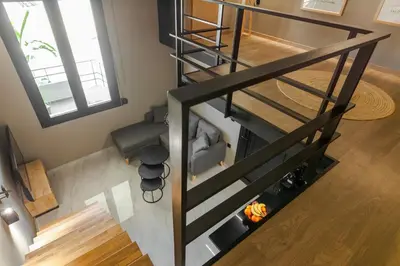 an overhead view of a spiral staircase in a house at Chrysma Urban Living in Rhodes Town