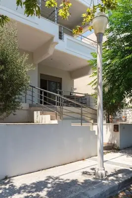 a street light in front of a building at J&G Rhodes city flat in Rhodes Town