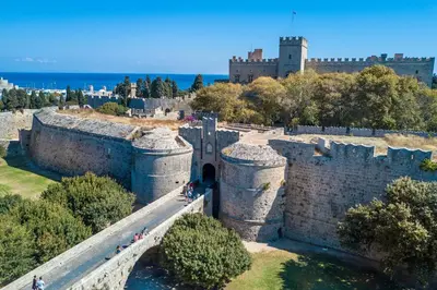 an aerial view of a castle with a bridge at Alexandras Stone House in Rhodes Town