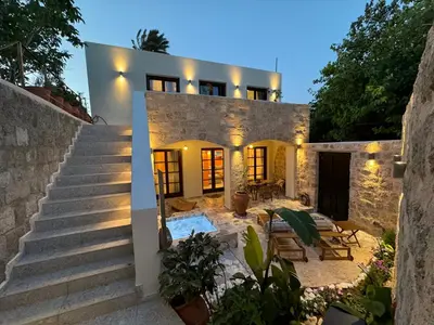 a villa with a swimming pool and stairs at Vetus Vicinato Luxury Homes in Rhodes Town