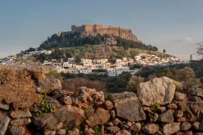 a village on top of a mountain at Residenza Maria Lindos Villa in Líndos
