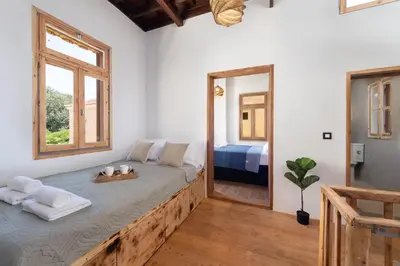 a bedroom with a large bed in a room at 3-4 Bedrooms Villa in old Town in Rhodes Town