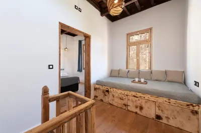 a bedroom with a bed and a window at 3-4 Bedrooms Villa in old Town in Rhodes Town