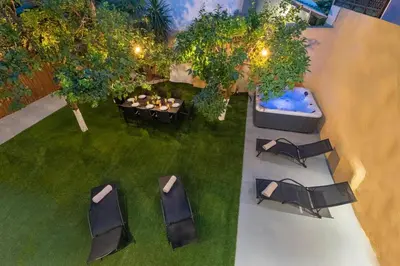 an overhead view of a patio with tables and chairs at 3-4 Bedrooms Villa in old Town in Rhodes Town