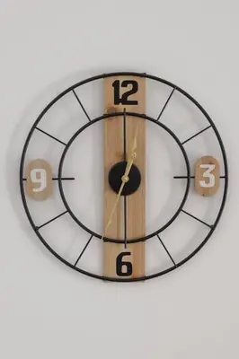 a black and wooden clock on a white wall at Andreas Rodos Apartment in Rhodes Town