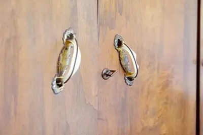 a close up of a wooden door with a door knob at Seaside Villa in Gennadi