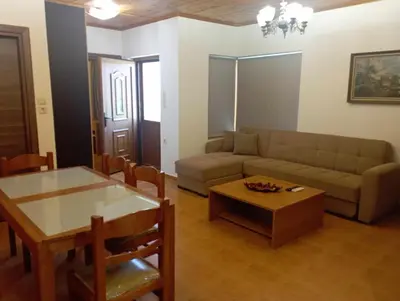 a living room with a couch and a table at Katavias House in Kattavía