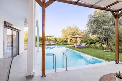 an image of a swimming pool in a house at Villa Bella Natura in Afantou