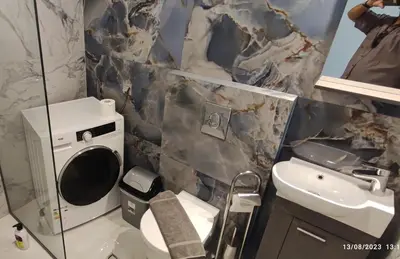 a bathroom with a toilet and a sink at Villa Marina apartment Jasmine in Ixia