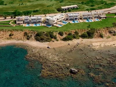 an aerial view of a resort on a cliff at Al Mare Villas in Kiotari