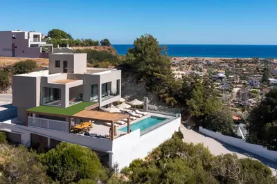 an aerial view of a house with a swimming pool at Mirena Luxury Living-Mirena Villa in Afantou