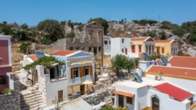 a view of a small town with houses at kalosymi house,Symi in Symi