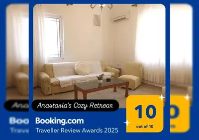 a living room with a couch and a coffee table at Anastasia's Cozy Retreat in Ialyssos