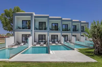 an image of a villa with a swimming pool at Tota Suites in Afantou