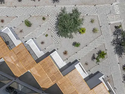 an overhead view of a patio with plants at Tota Suites in Afantou