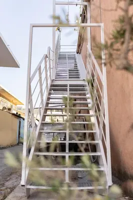 a stairway leading up to a building at La Terrazza Sul Mare in Rhodes Town