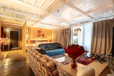 a living room with a couch and a table at La Terrazza Sul Mare in Rhodes Town