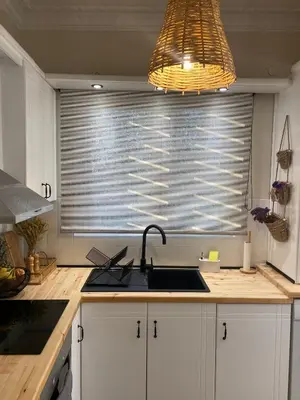a kitchen with a sink and a window at Bohemian Paradise Villa in Paradeísion