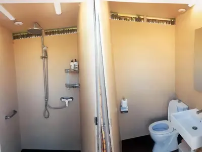 a bathroom with a shower and a toilet and a sink at Villa Angelina in Pefki Rhodes